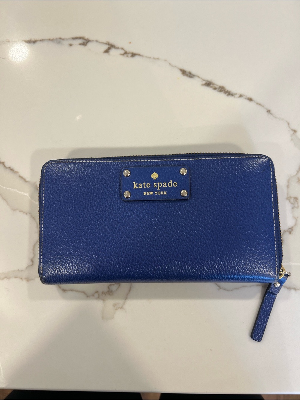 kate spade cobalt blue pebbled zip-around wallet